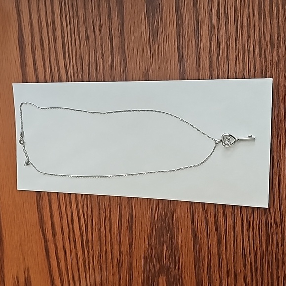 HEART Key necklace with floating princess cut CZ on a silver small link chain - Picture 2 of 4